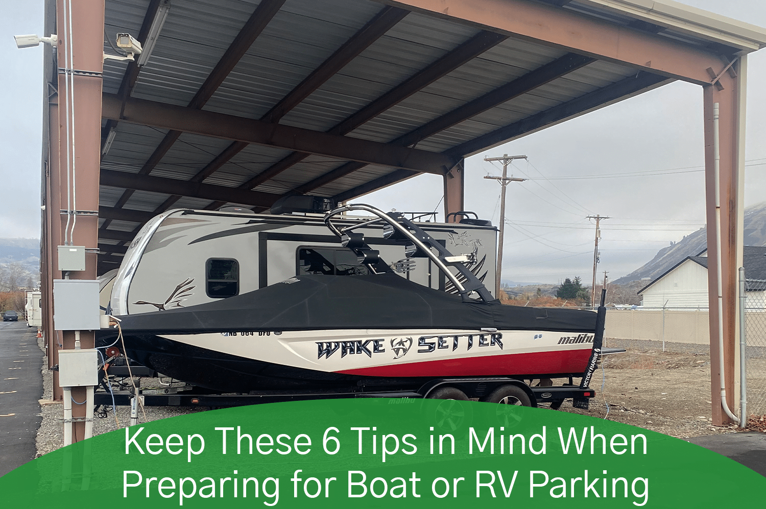 A boat parked under covered boat and RV parking.