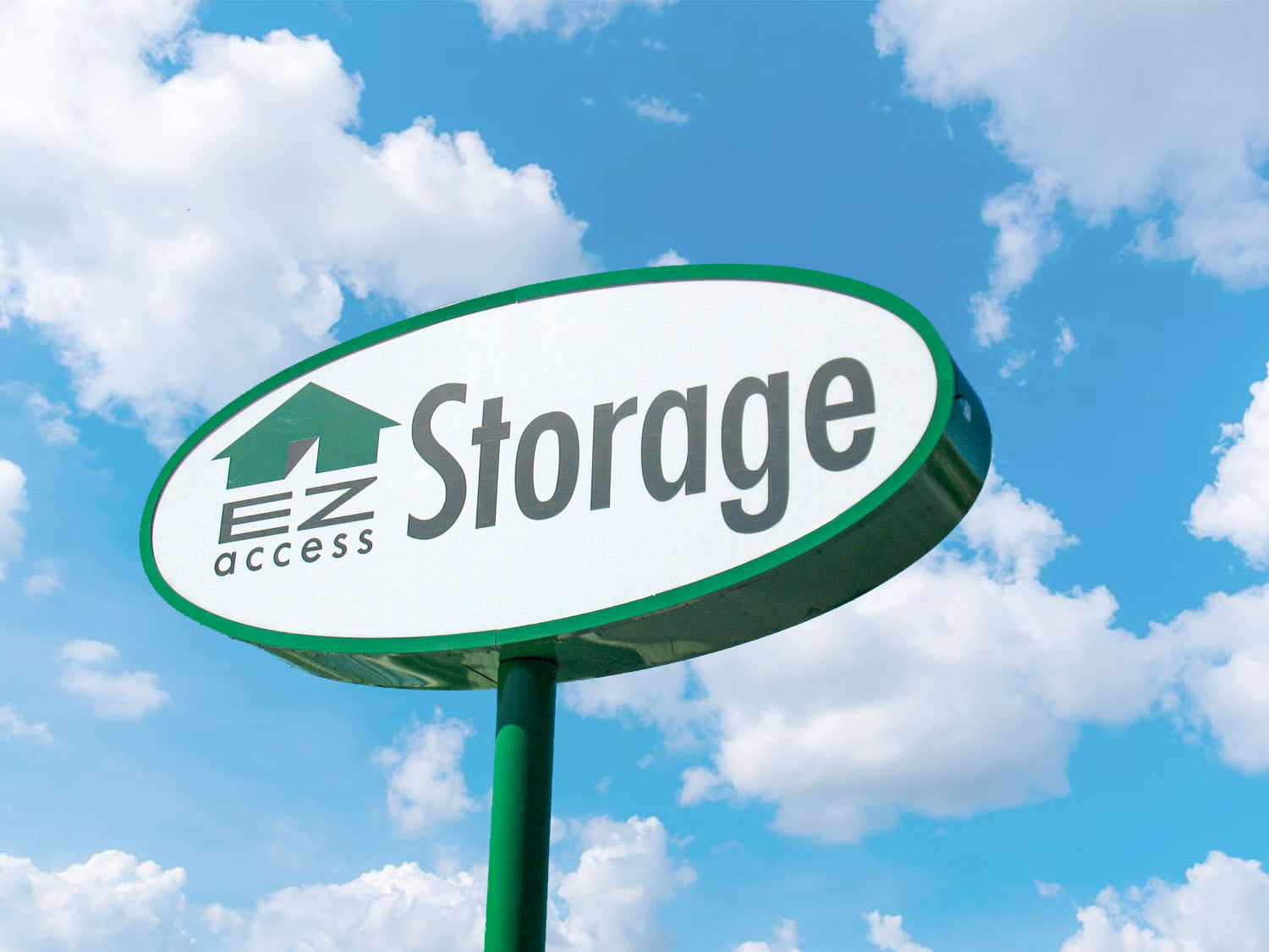 EZ Access Storage facility sign with cloud background