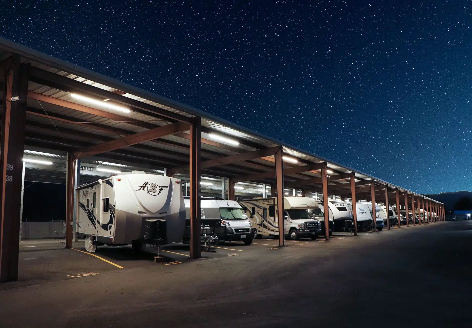 Parking spaces at night with starry sky