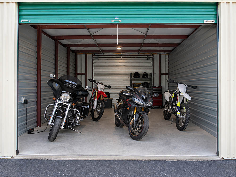 10×20-motorcycle-storage Four motorcycles stored inside a 10 x 20 enclosed motorcycle storage unit